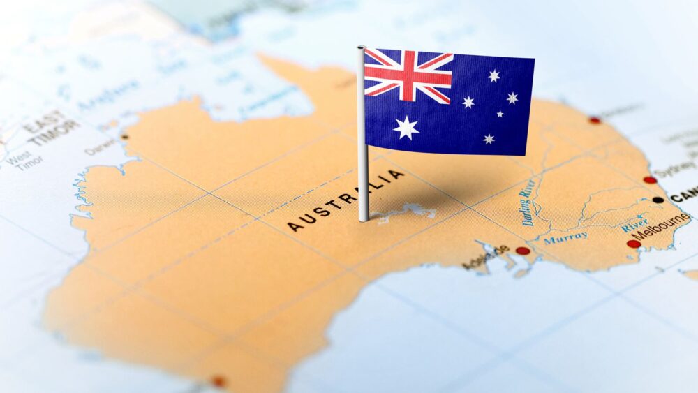 Map of Australia with Australian flag pinned in the centre